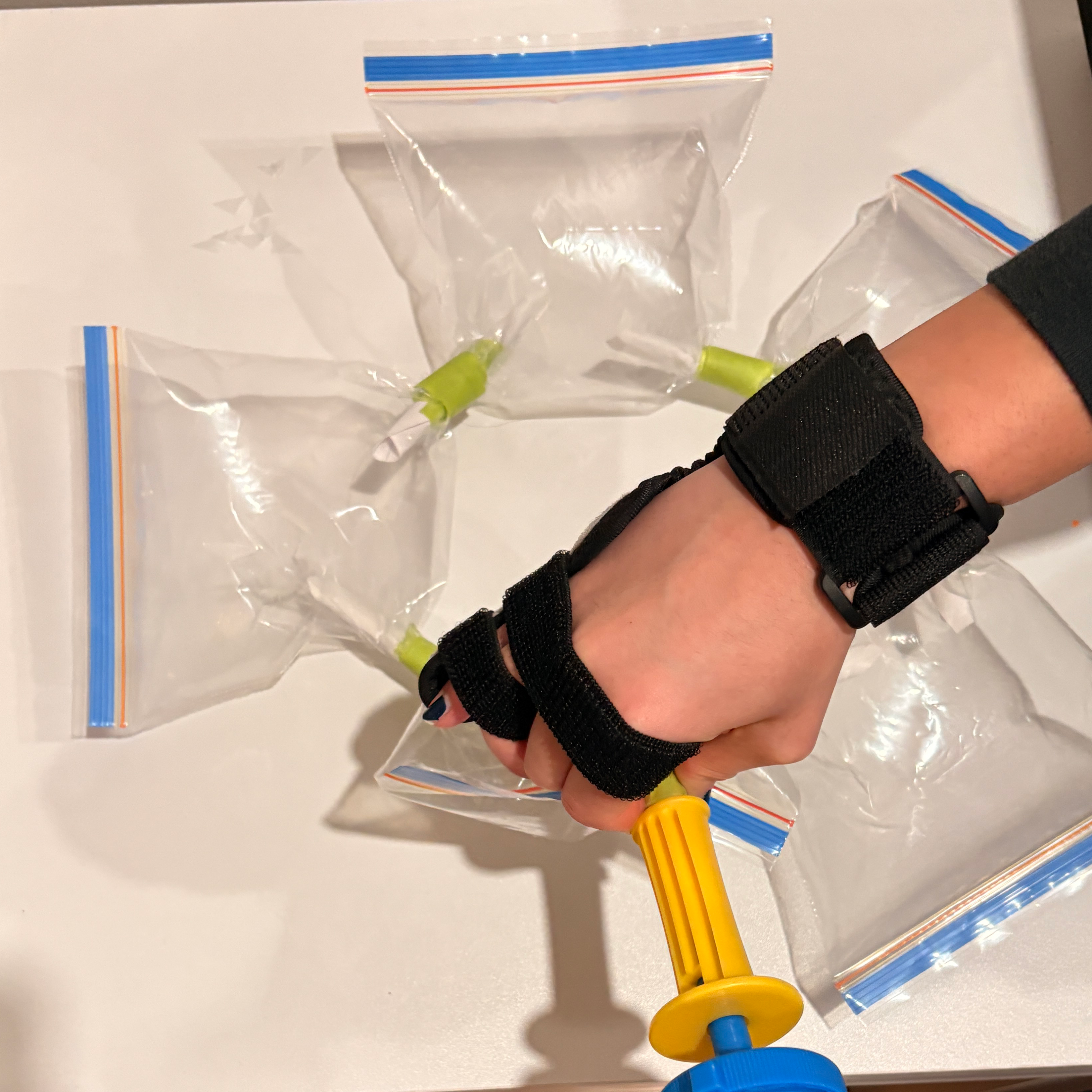 Here is the image of me testing the prototype by pumping air into it. The bags held the air well and the tubes kept the bags connected.